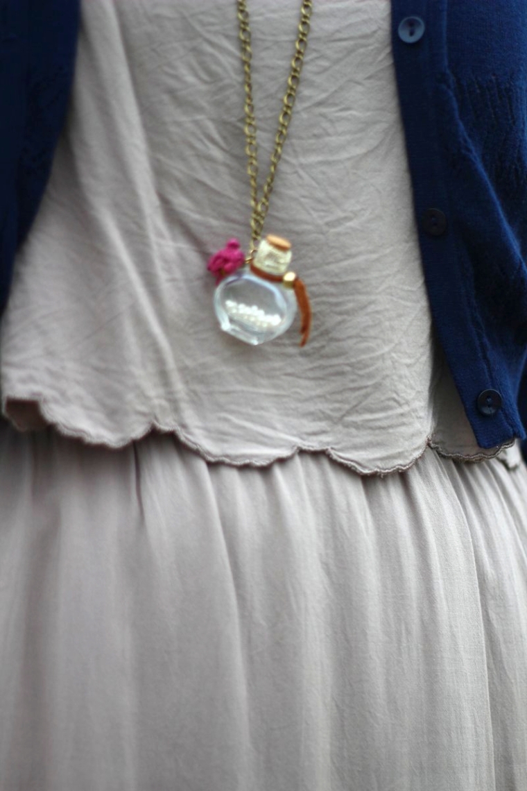 Outfit details: gold chain necklace, pearls in a bottle necklace