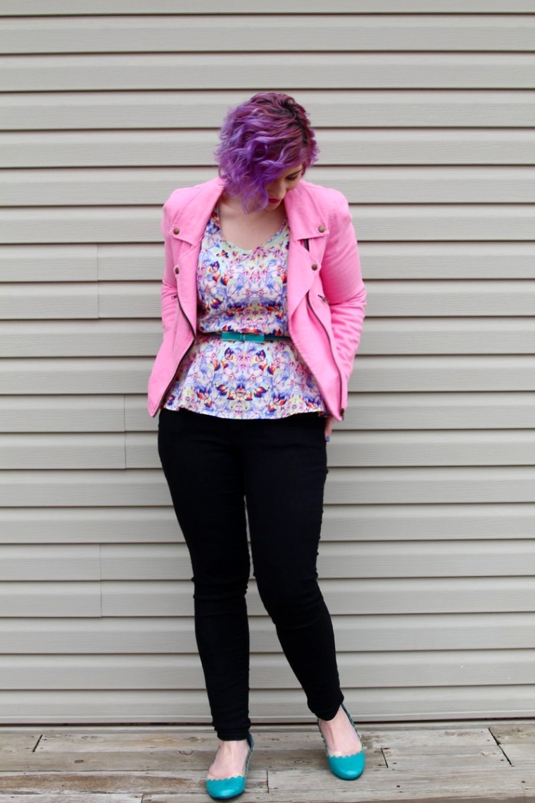 Outfit: Abstract printed peplum sleeveless top, pink moto jacket, teal belt, black jeans, teal low chunky heels